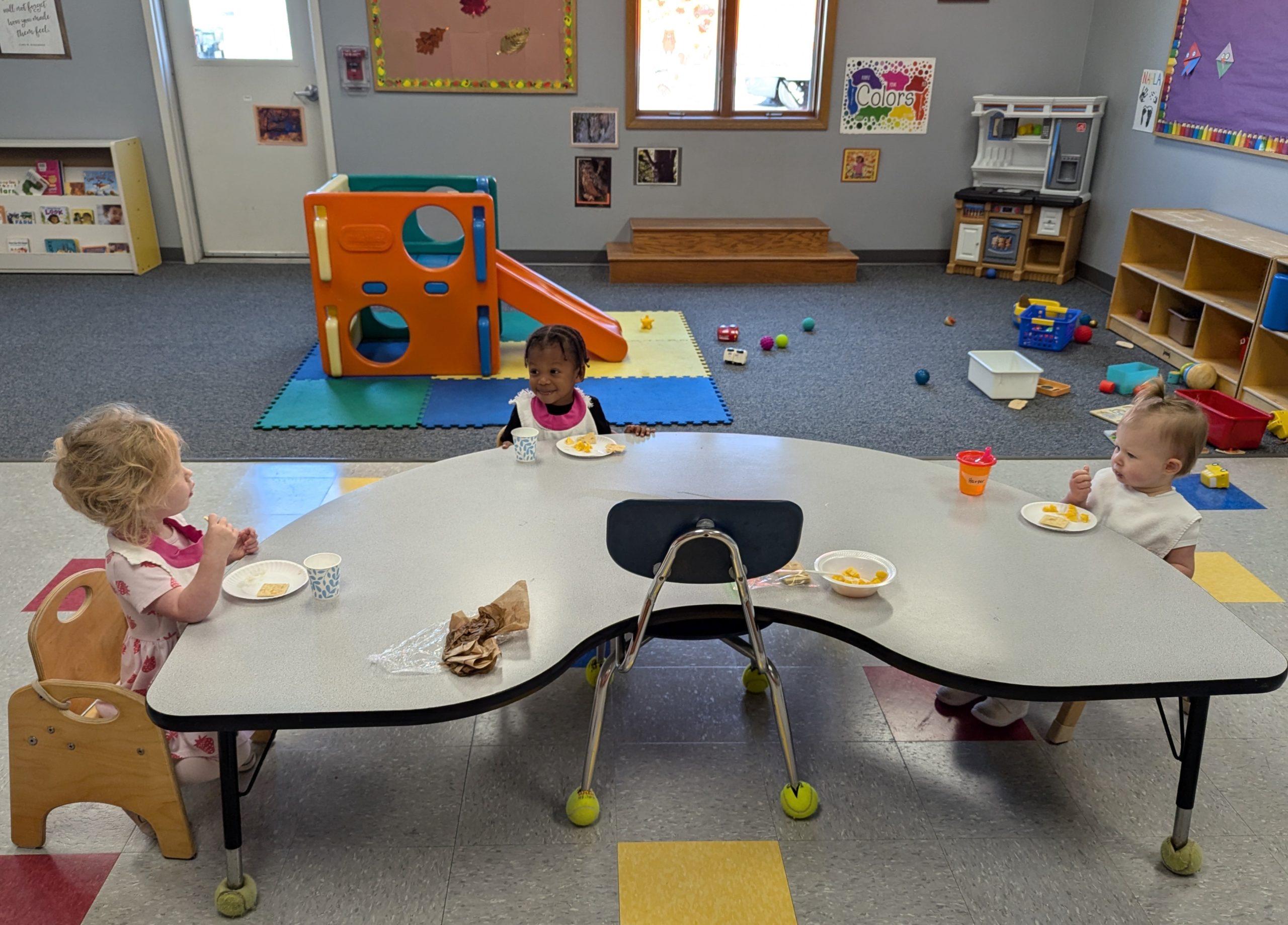 Children playing and learning at Early Learning Center child care in Neenah, WI — photo 1 of 16