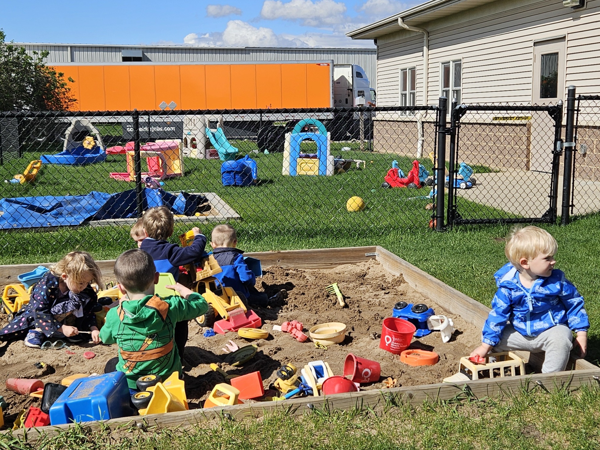 Children playing and learning at Early Learning Center child care in Neenah, WI — photo 9 of 16